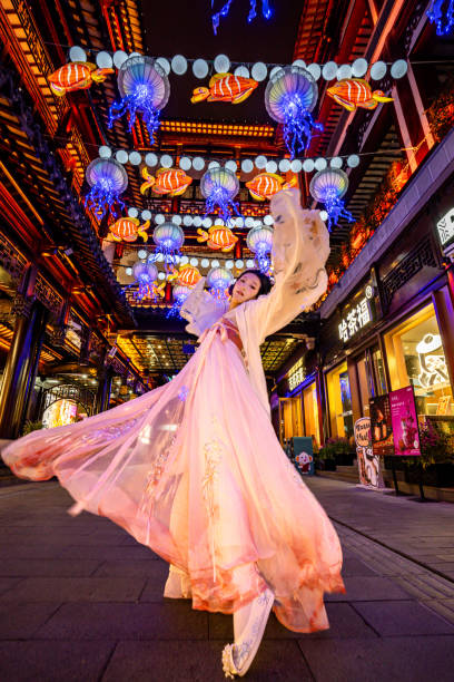 chinese gilr in hanfu celebrating chinese lantern festival